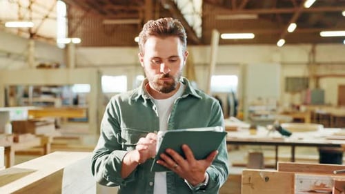Carpentry, tablet and man for woodwork in factory for furniture production