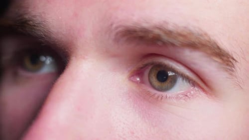 Close Up Of Young Adult Opening Eyes