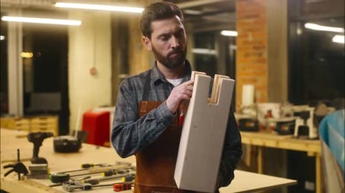 Caucasian Carpenter Builder Wood Master Man Holding Wooden Craft in Workshop Joiner Worker Male