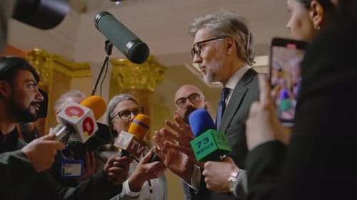 Politician Speaking to Reporters at a Press Conference