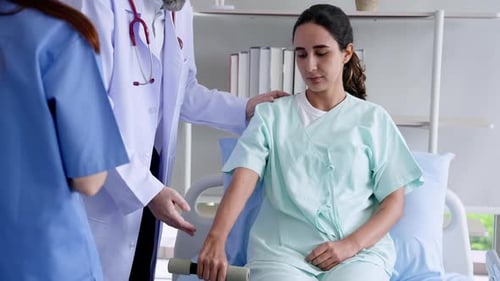 Hispanic woman recovering from broken arm Trying to test dumbbell lift. To restore muscles to come