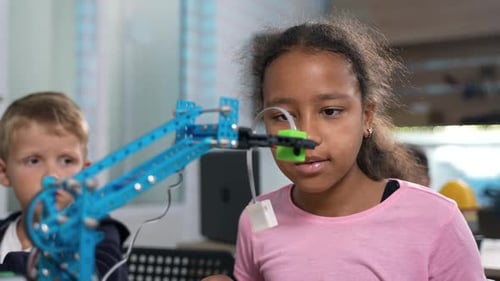 Children Building a Robot in the Classroom
