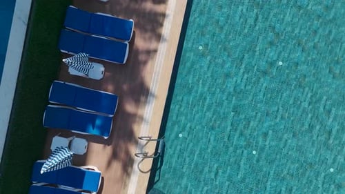 Aerial View Completed Residential Complex With Bright Blue Pool and Water Slides By the Sea