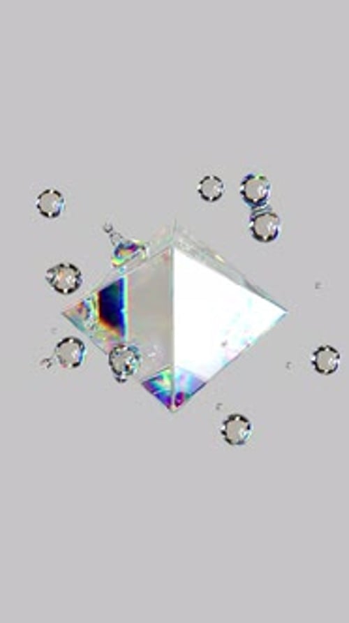 Metaball liquid transparent iridescent blobs with rotating octagon.