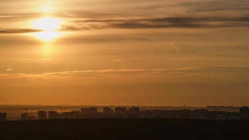 Sunset in the summer is a time lapse of nature's beauty, with red clouds painting the sky, time laps