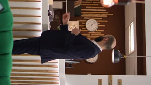 Hotel Guest Checking in at the Reception Desk