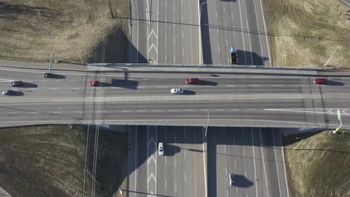 aerial hold overpass freeway on a hot summer morning commuter rush hour quiet less traffic than norm