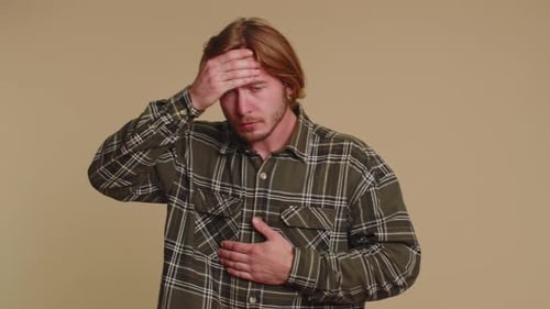 Man Coughing with Fever in Mid Shot