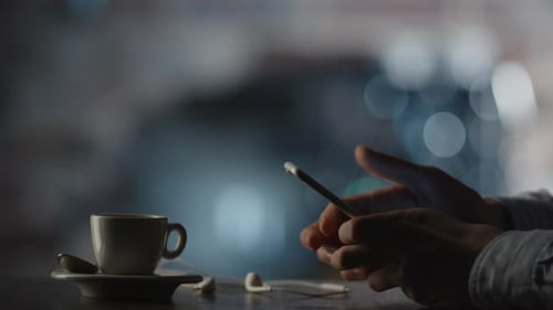 Using Mobile Phone in Coffee Shop