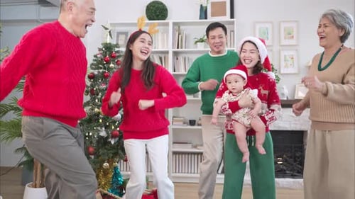 Multigenerational Family Celebrates Christmas with Dancing