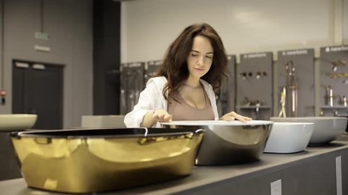 A Woman Buys a Sink and a Faucet Plumbing Shop