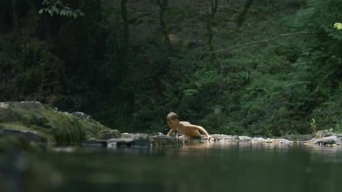 Boy Swims in Cold Natural Pond Creative Boy Dives Into Natural Pond in Forest Boy Swims in Lake in