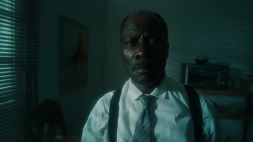 Portrait of Confident African American Investigator at Crime Scene