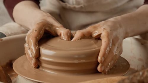 Potter Making Ceramic Plate on Pottery Wheel Top View Clay Product