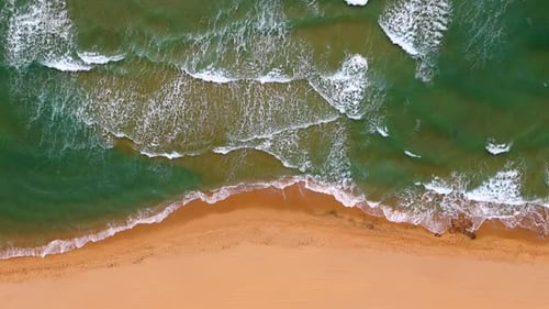 The Beach Displays a Serene Landscape with Golden Sands Calming Waves Italy