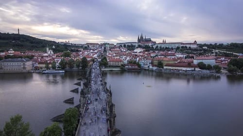 Day to night sunset timelapse from Prague, Czech Republic from Old Town Bridge Tower with a view of
