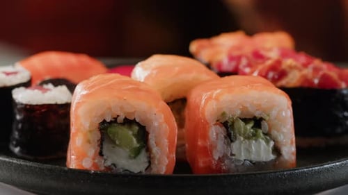 Sushi Sashimi Nigiri Platter Japanese Gunkan Maki Sushi Restaurant Fresh Tuna and Salmon Slices in