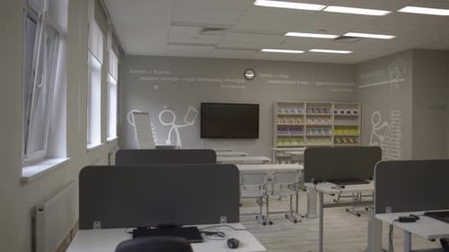 Modern Classroom Features Television Mounted on Wall