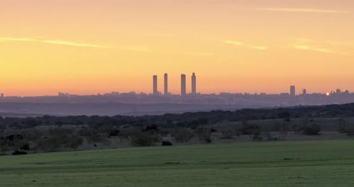 Timelapse of a beautiful sunrise in Madrid, Spain. Madrid skyline and colorful clouds at sunrise.