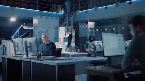 Teamwork in a futuristic tech workplace