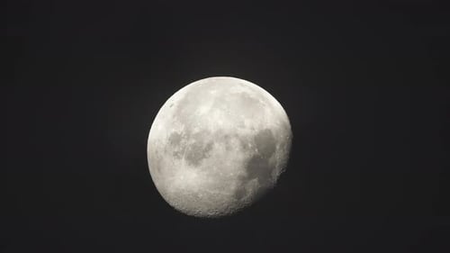 dark night full moon rising with clouds at night