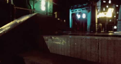 Rain Soaked Steps Lead to a Vibrant Urban Alley at Night