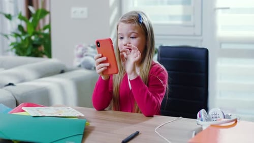 Close Up Girl Staying at Modern Home and Doing Homework Use on Phone Schoolgirl Portrait Quarantine