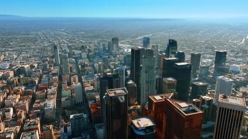 Flight over the roofs of skyscrapers in the downtown of Los Angeles, California, USA.