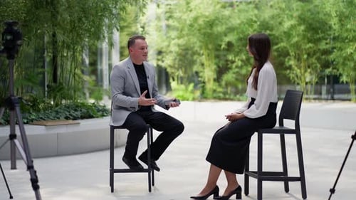 Professional Interview Setup with Man and Woman