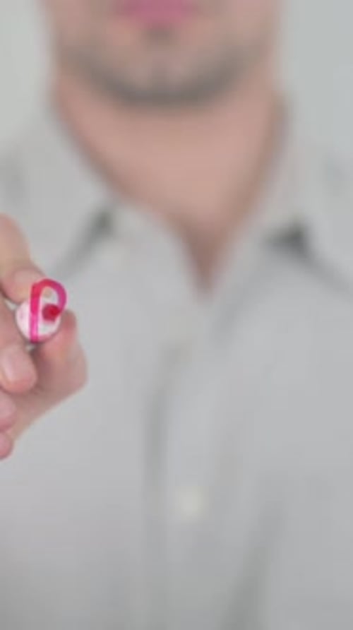 Hand Writes BANKERO on Glass Surface