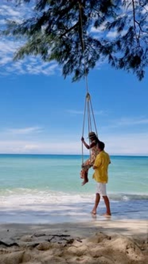 Experience Joy and Tranquility on Koh Kood's Beautiful Beach Swing