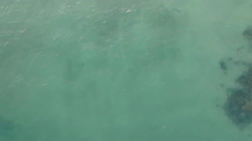 Aerial view of beach with waves, Kenya.