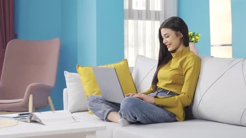 Woman Student Studying on Laptop At Home