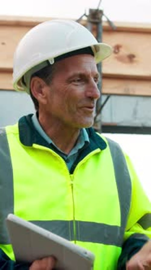 Architect, construction site and man with tablet for planning, discussion or meeting for decision