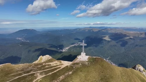 View of the Cross of Heroes on Mount Caraiman in the Bucegi Mountains, Romania