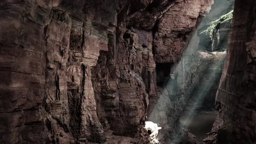 A Cave Filled with Lots of Rocks and Water