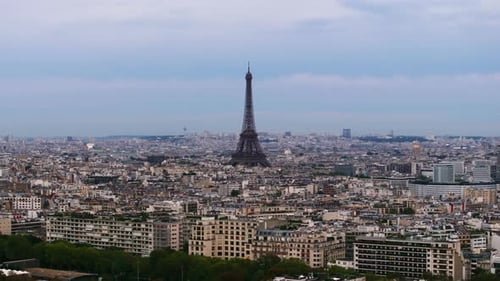 Aerial Footage of City with Its Famous Landmarks Dominating Lattice Construction of Eiffel Tower