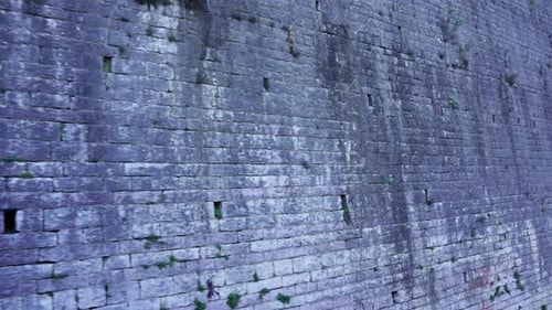 Stone wall texture of medieval building in Albania, copy space for historic place