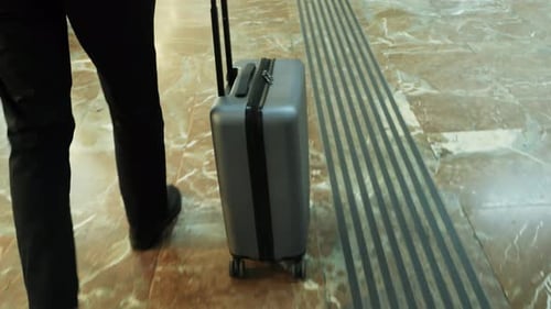 Tourist Man with Suitcase Baggage in Spain A Traveler with Luggage Suit Jacket on Business Street Go