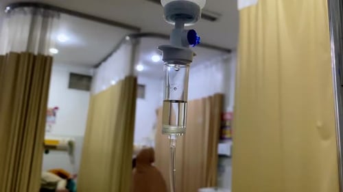close up of a intravenous drip hose on the emergency room. IV drip tubes in a hospital room
