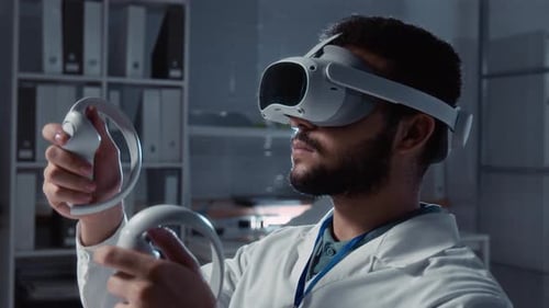Male Researcher in Augmented Reality Headset Performing Experiment in Lab