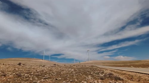 Wind Turbines in Desert Landscape