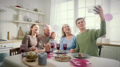 Happy Family Celebrating Birthday with a Selfie