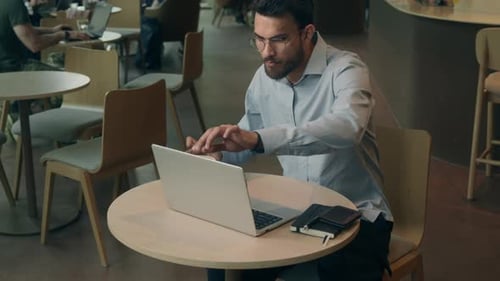 Indian Business Guy Male Arabian Man Businessman Finishing Complete Work in Cafe Put Money on Table
