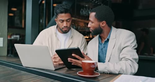 Remote work, tablet and teamwork with business people in cafe for meeting