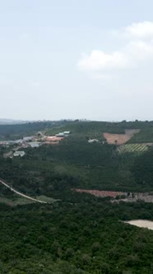 Rural Area with Crop Fields in the Mountains of Vietnam From a Bird's Eye View