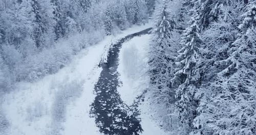 Aerial View of Cold Frozen Snowing Winter Scenery Background