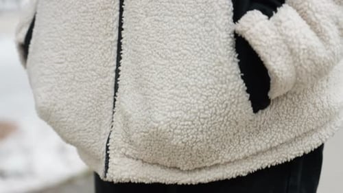 CloseUp of Winter Jacket with Hand in Pocket