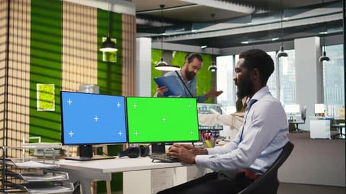 Technician Using Green Screen PC to Code AI Algorithms Debugging Software