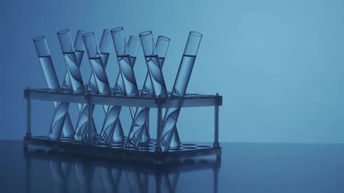 Close Up Video Neon Blue Light Test Tubes Filled with Fluid in a Laboratory Scientific Experiment